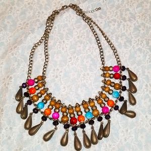 Colorful beaded necklace with rubbed bronze chain